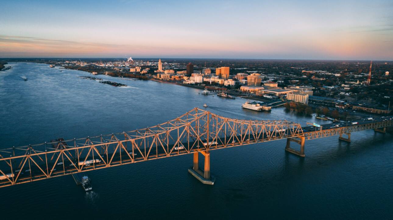 Sunset photograph of the Mississippi River Bridge in downtown Baton Rouge.