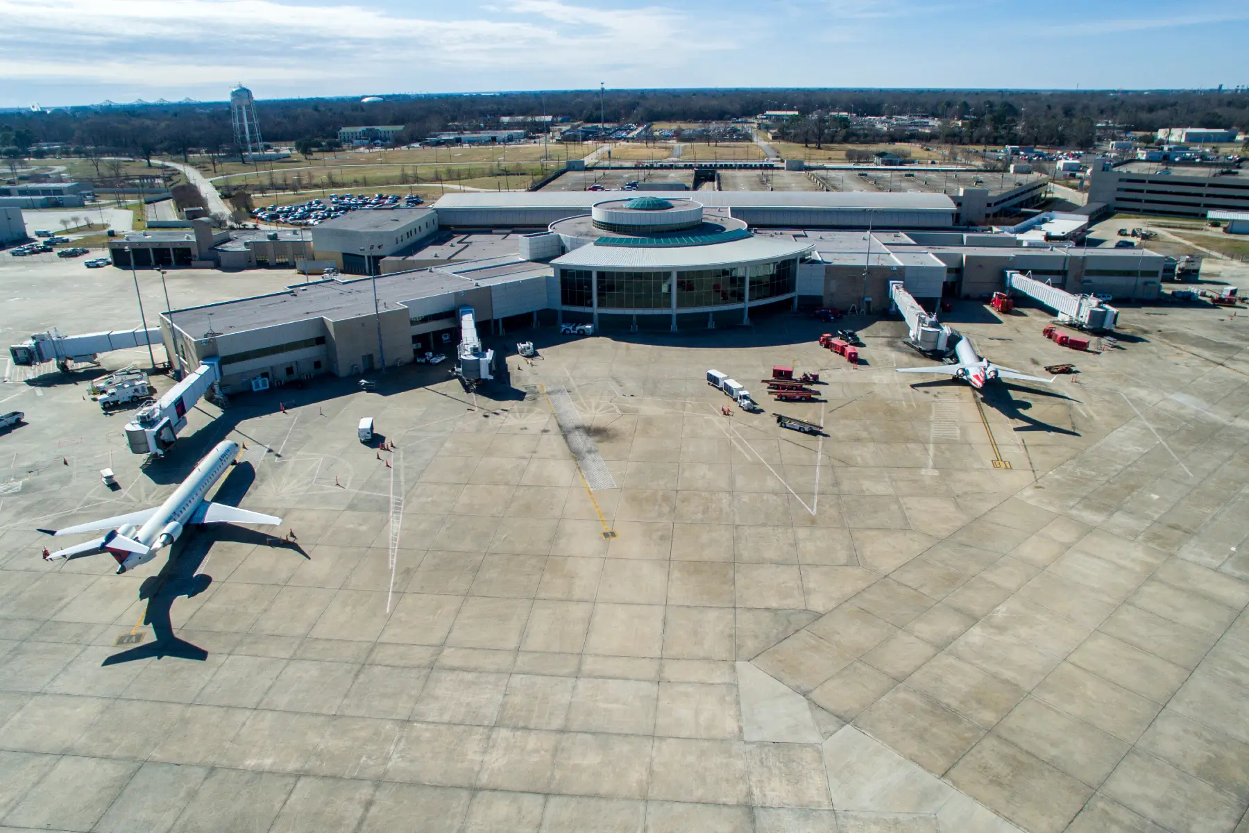 Airplanes parked at terminal at Baton Rouge Metropolitan Airport